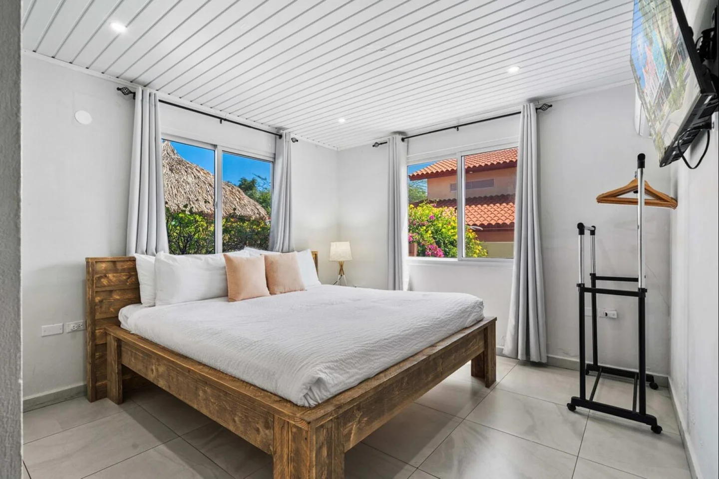 Bedroom with custom bed and garden view